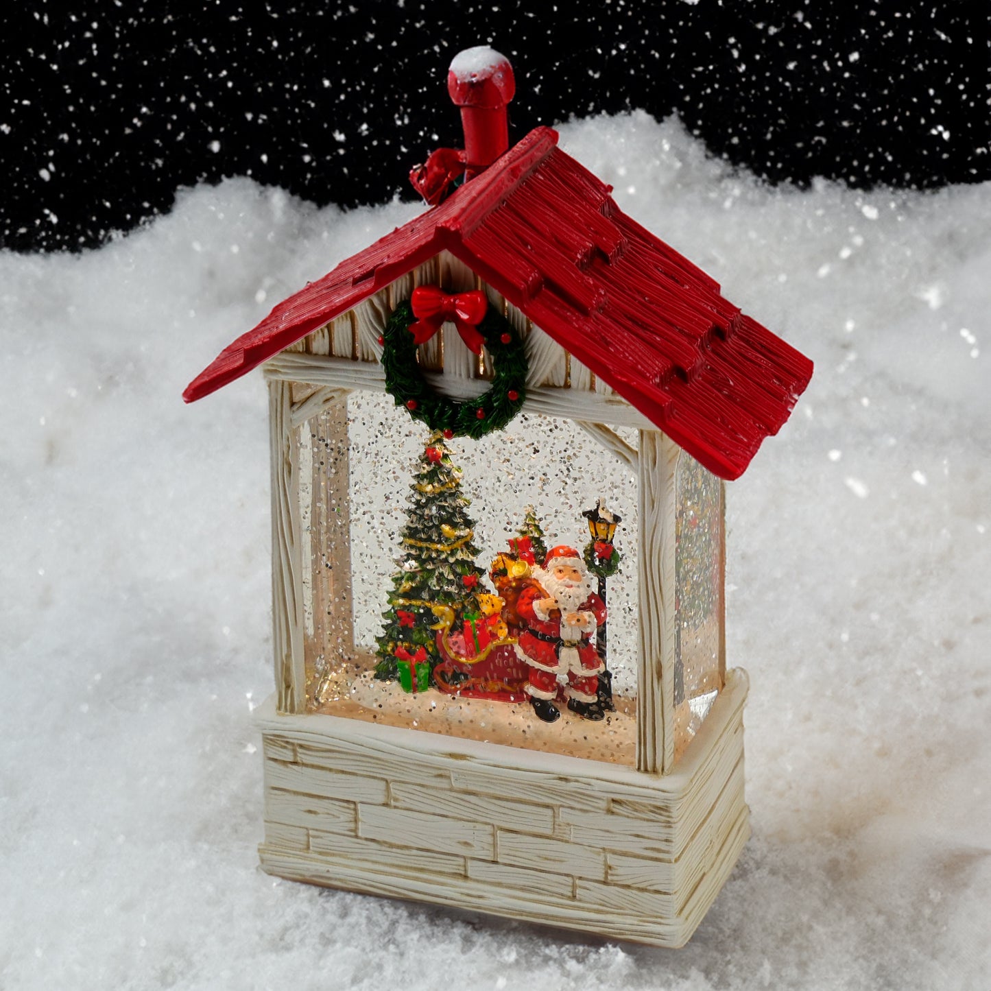 Glitzerhaus mit rotem Dach mit LED