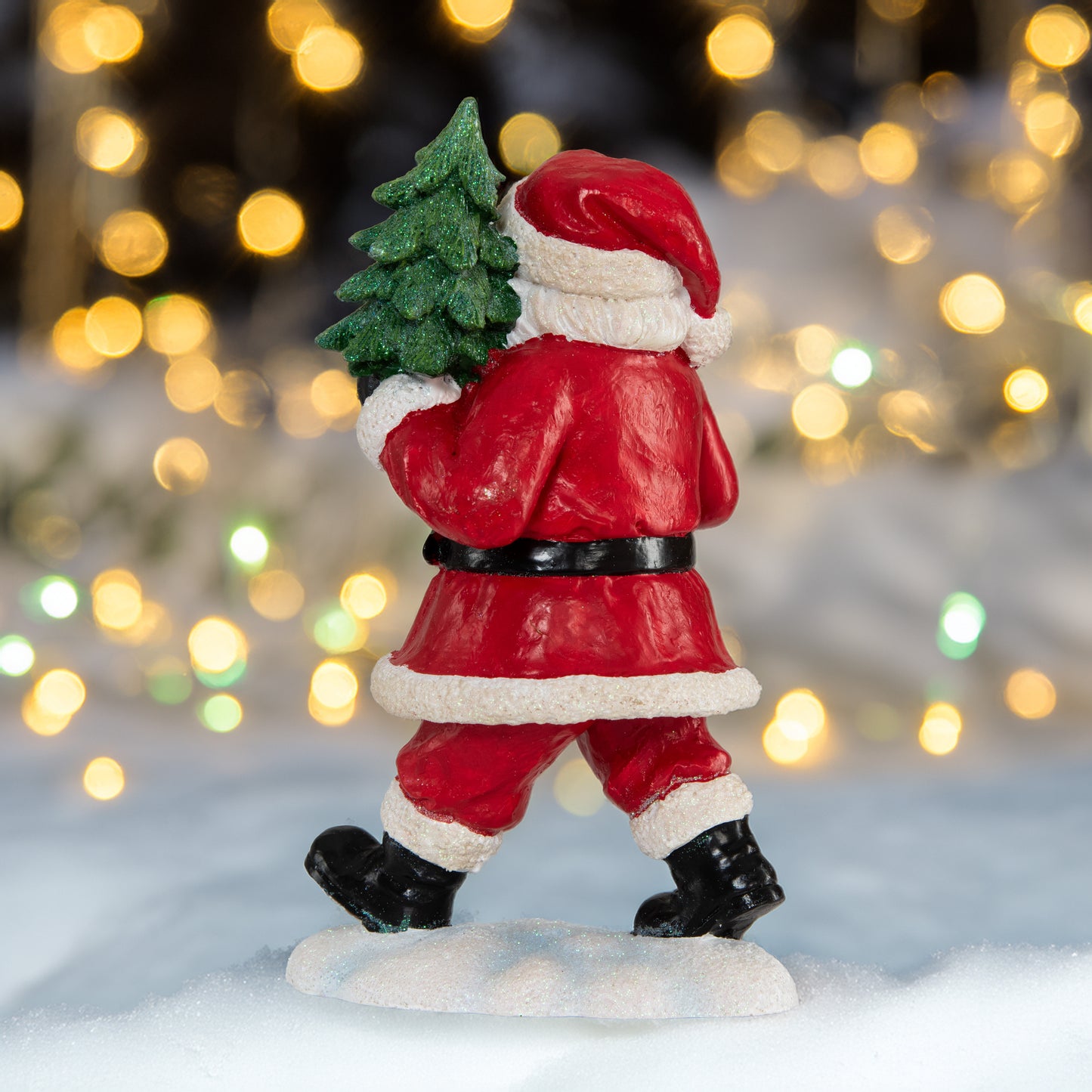 Weihnachtsmann mit Glocke und Tanne