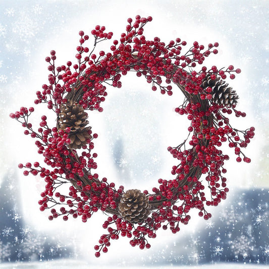 Weihnachtskranz mit roten Beeren und Pinienzäpfen