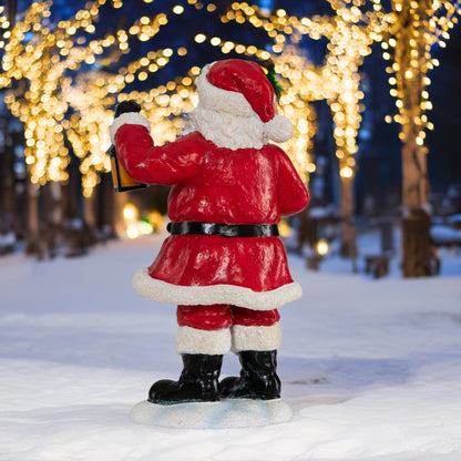 Weihnachtsmann mit Kranz und Laterne