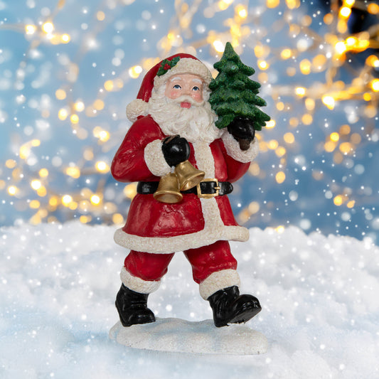 Weihnachtsmann mit Glocke und Tanne