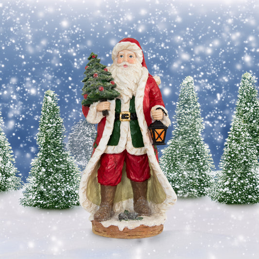 Weihnachtsmann mit Laterne und Weihnachtsbaum