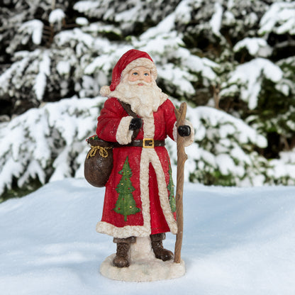 Weihnachtsmann mit Gehstock und Geschenken